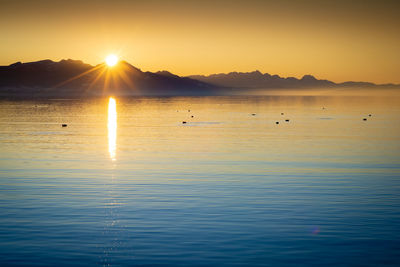 Scenic view of sea against sky during sunset