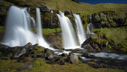 Scenic view of waterfall in forest
