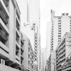 Low angle view of skyscrapers against clear sky
