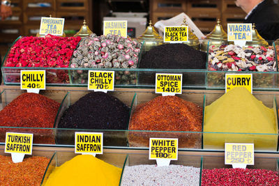 Various fruits and spices for sale in store