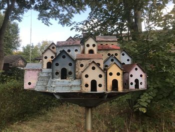 Close-up of birdhouse on field