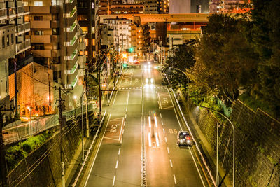 High angle view of cars on road at night