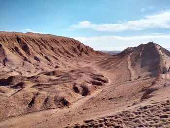 Scenic view of desert against sky