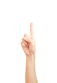 Close-up of human hand against white background