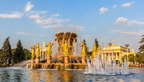 View of fountain in park against sky
