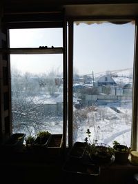 Scenic view of glass window against sky
