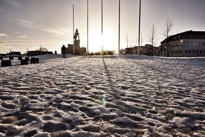 Surface level of built structures against sunset