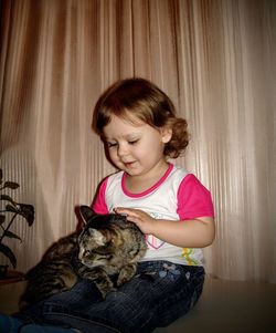 Girl sitting in a horse