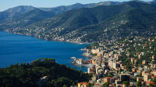 High angle view of city by sea