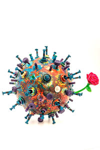 High angle view of multi colored decoration on white background