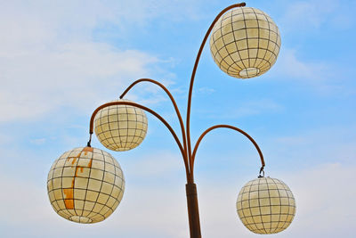 Low angle view of street light against sky