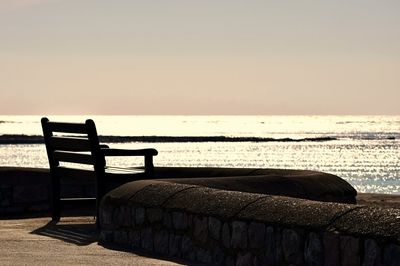 Scenic view of sea against sky at sunset