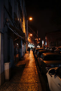 Illuminated street at night