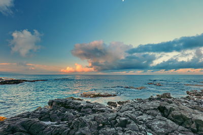 Scenic view of sea against sky during sunset