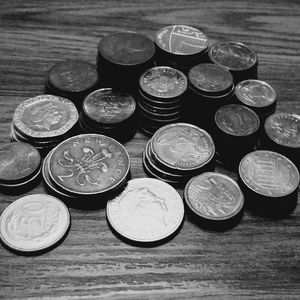 Close-up of coins on table