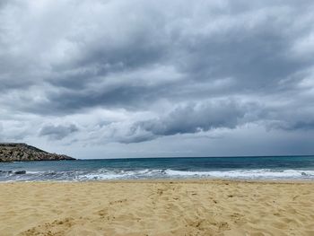 Scenic view of beach against sky