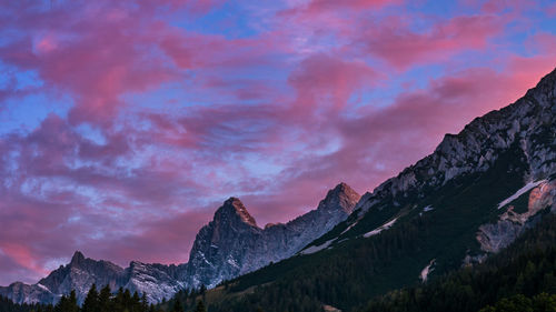 Scenic view of mountains against sky during sunset