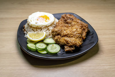 High angle view of breakfast served on table