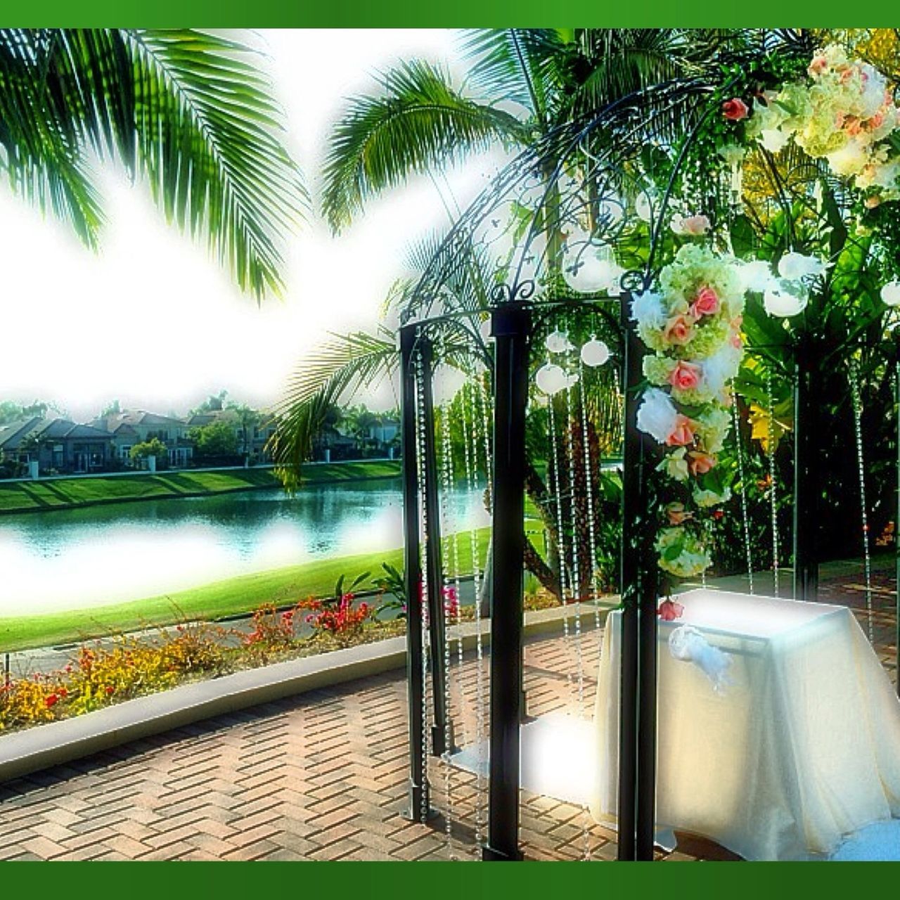 water, tree, growth, flower, beauty in nature, nature, plant, reflection, park - man made space, fountain, railing, lake, pond, tranquility, day, sky, sunlight, tranquil scene, grass, outdoors