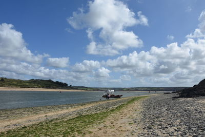 Scenic view of beach against sky