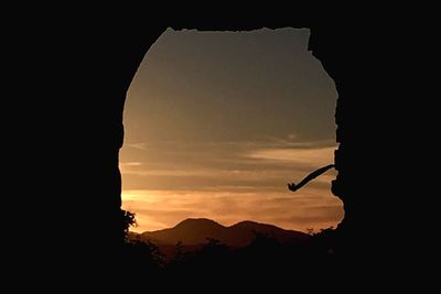Silhouette of person at sunset