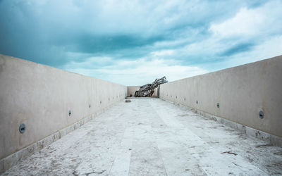 Building terrace against cloudy sky