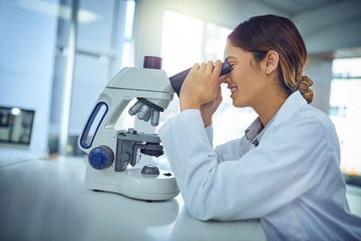 Female scientist doing research at lab