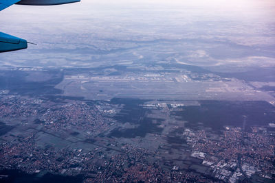 Aerial view of cityscape against sky