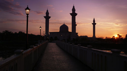 View of historical building against sky during sunset