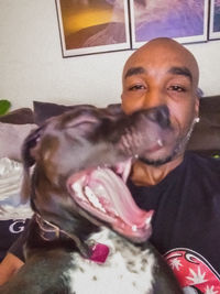 Portrait of smiling man relaxing at home