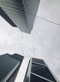 Low angle view of modern buildings against sky