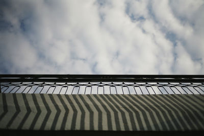 Low angle view of roof and building against sky