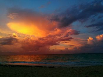 Scenic view of dramatic sky over sea