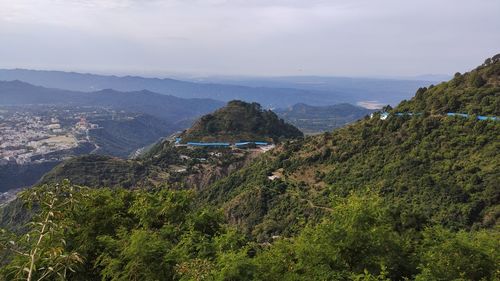 High angle view of plants and mountains against sky