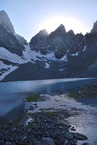 Scenic view of lake with mountains in background