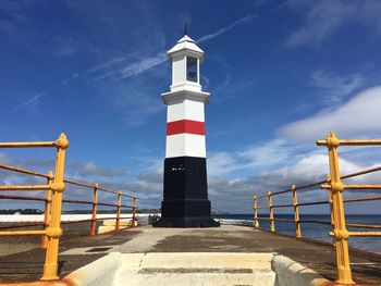 Lighthouse situated on the breakwater at ramsey harbour in the isle of man