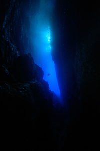 Low angle view of rock formation in sea