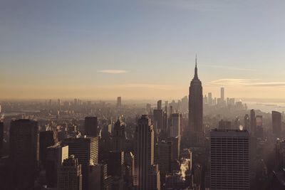 View of cityscape against sky during sunset