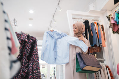 Mother and daughter shopping in mall