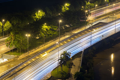 High angle view of light trails on street at night