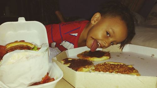 Close-up of man eating food