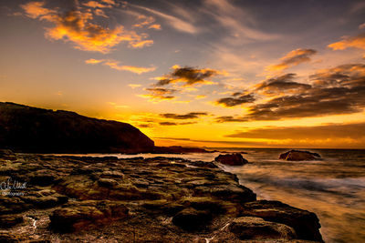 Scenic view of sea against sky during sunset