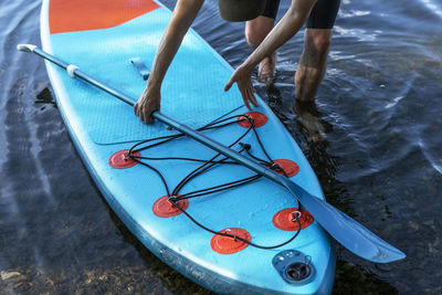 Low section of woman in boat