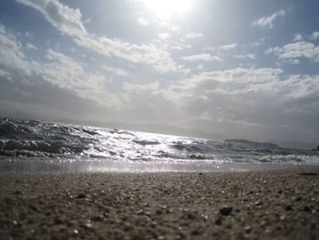 Scenic view of beach and sea against sky