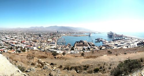 High angle view of buildings by sea