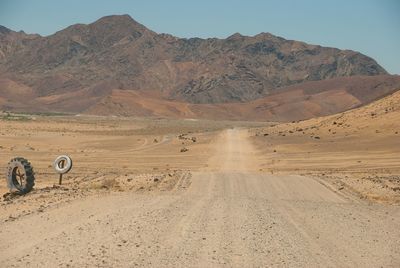 Scenic view of desert against clear sky