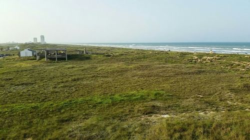 Scenic view of sea against clear sky