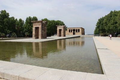 View of swimming pool in front of building