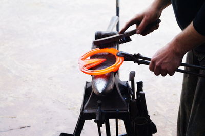 Man working on metal structure