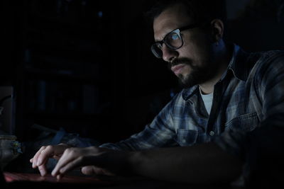 Portrait of young man looking at camera